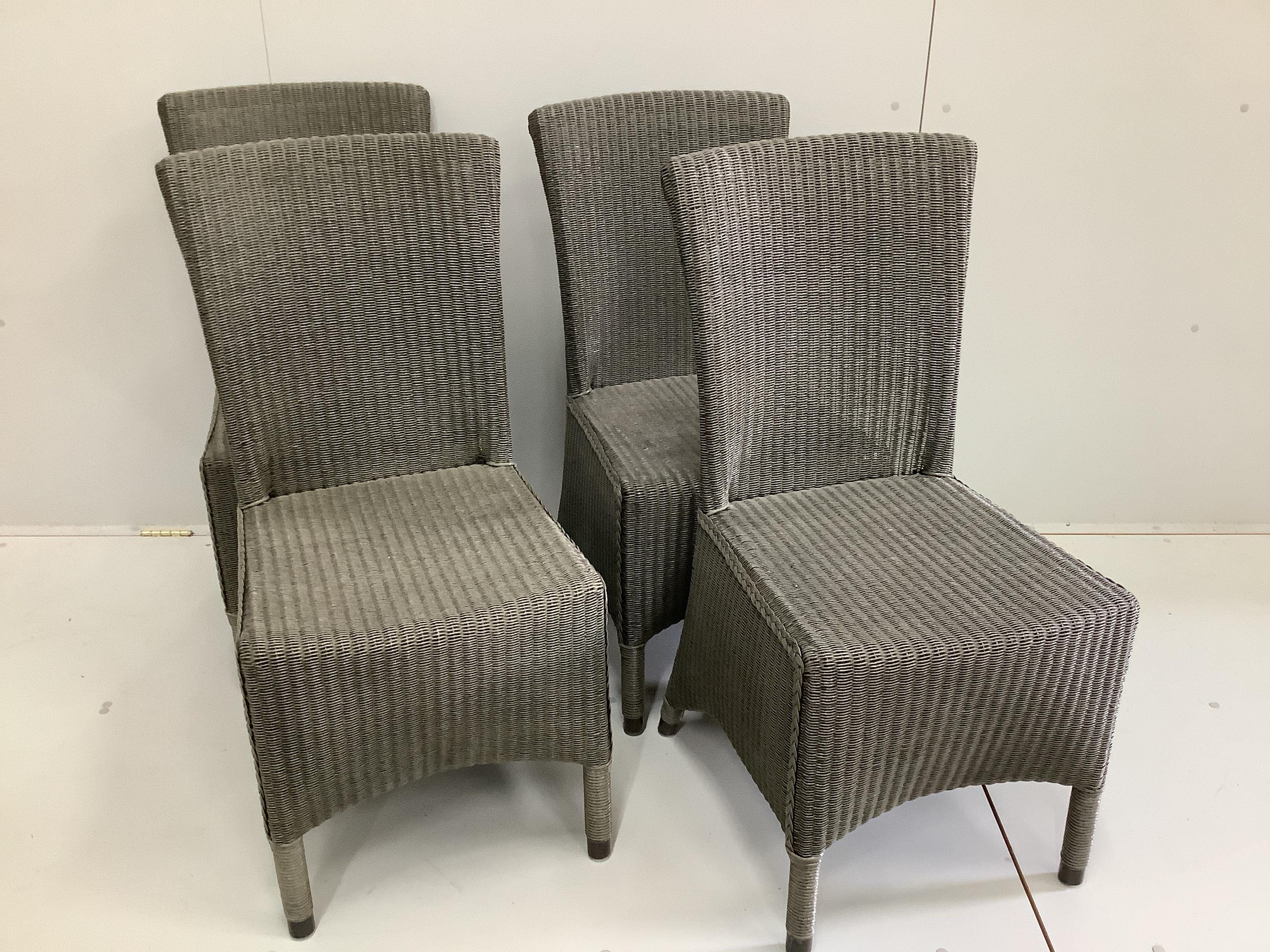 A set of four Neptune all weather rattan garden chairs